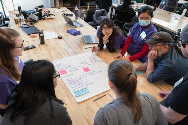 students collaborating in a lab