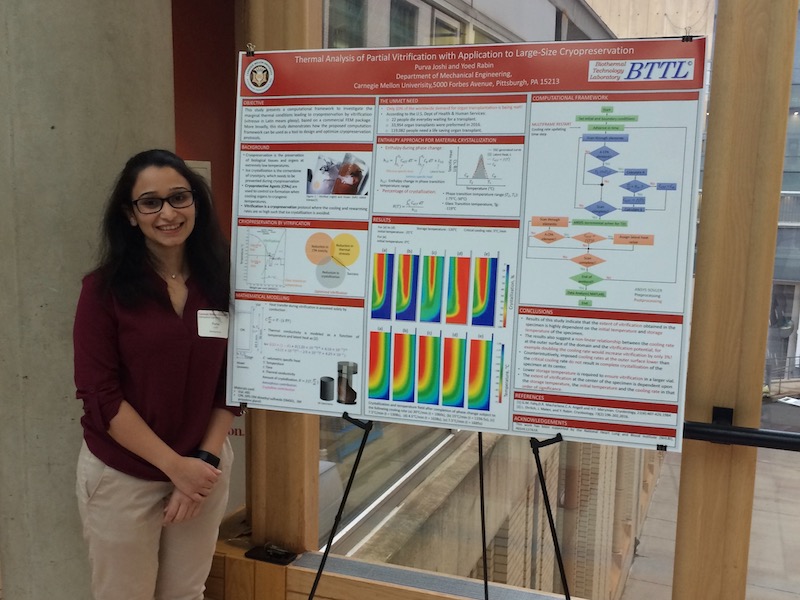 Ph.D. student presenting a poster on cryopreservation research. 