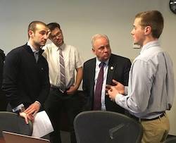 Students explain tribology to Congressman Doyle.