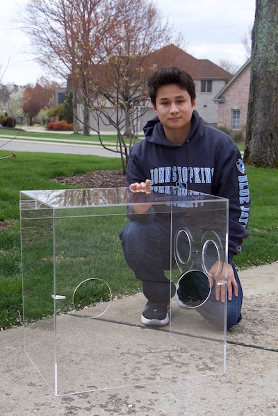 Aydin Turkay with an intubation box he helped to make. 